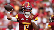 Washington Commanders quarterback Jayden Daniels (5) drops back to pass against the Tampa Bay Buccaneers in the third quarter at Raymond James Stadium. Mandatory Credit: Nathan Ray Seebeck-Imagn Images