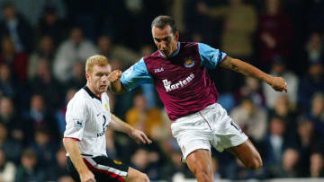 Paolo Di Canio of West Ham United and Paul Scholes of Manchester United