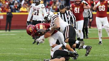 Nov 2, 2024; Ames, Iowa, USA;  Texas Tech Red Raiders linebacker Jacob Rodriguez (10) forces a fumble by Iowa State Cyclones tight end Gabe Burkle (84) at Jack Trice Stadium. The Red Raiders won 23-22.  Mandatory Credit: Reese Strickland-Imagn Images