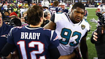 Jan 21, 2018; Foxborough, MA, USA; New England Patriots quarterback Tom Brady (12) greets Jacksonville Jaguars defensive end Calais Campbell (93) following the AFC Championship at Gillette Stadium. Mandatory Credit: Mark J. Rebilas-Imagn Images