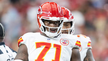 Aug 9, 2025; Glendale, Arizona, USA; Kansas City Chiefs offensive tackle Josh Simmons (71) against the Arizona Cardinals during a preseason NFL game at State Farm Stadium. Mandatory Credit: Mark J. Rebilas-Imagn Images