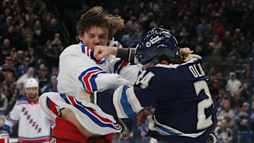 Mathieu Olivier lands a punch on Matt Rempe during a fight