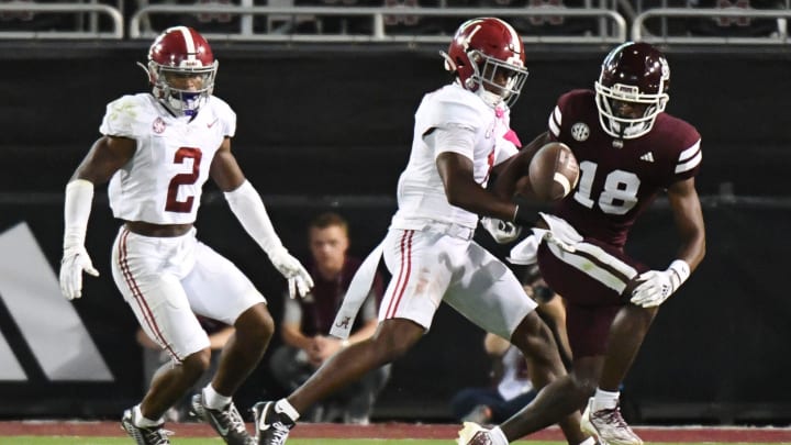 Sep 30, 2023; Starkville, Mississippi, USA; Alabama Crimson Tide defensive back Kool-Aid McKinstry (1) breaks up a pass intended for Mississippi State Bulldogs wide receiver Jordan Mosley (18) in Davis Wade Stadium at Mississippi State University. Alabama defeated Mississippi State 40-17. Mandatory Credit: Gary Cosby Jr.-Tuscaloosa News