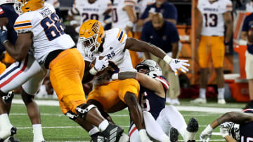 Sep 16, 2023; Tucson, Arizona, USA; Arizona Wildcats defensive lineman Ta'ita'i Uiagalelei (46) makes a tackle against UTEP Miners running back Deion Hankins (3) during the second half at Arizona Stadium. Mandatory Credit: Zachary BonDurant-USA TODAY Sports