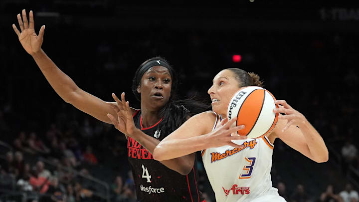 Jun 29, 2022; Phoenix, Arizona, USA; Phoenix Mercury guard Diana Taurasi (3) drives against Indiana Fever center Queen Egbo (4) during the first half at Footprint Center. Mandatory Credit: Joe Camporeale-Imagn Images