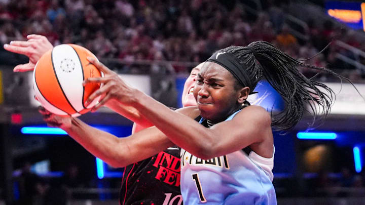 Chicago Sky center Elizabeth Williams (1) grabs the ball Saturday, Aug. 9, 2025, during a game between the Indiana Fever and the Chicago Sky at Gainbridge Fieldhouse in Indianapolis.