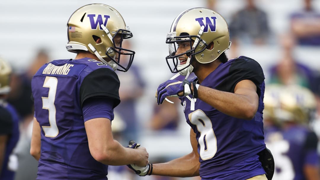 Sep 16, 2017; Seattle, WA, USA; Washington Huskies wide receiver Dante Pettis (8) greets quarterback Jake Browning (3) during pregame warmups against the Fresno State Bulldogs at Husky Stadium. Mandatory Credit: Joe Nicholson-Imagn Images Sep 16, 2017; Seattle, WA, USA; Washington Huskies wide receiver Dante Pettis (8) greets quarterback Jake Browning (3) during pregame warmups against the Fresno State Bulldogs at Husky Stadium. Mandatory Credit: Joe Nicholson-Imagn Images
