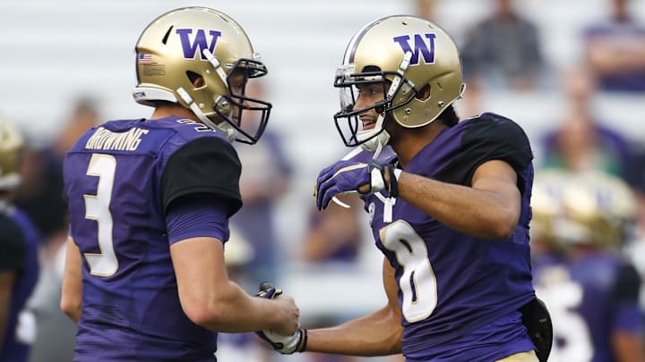 Sep 16, 2017; Seattle, WA, USA; Washington Huskies wide receiver Dante Pettis (8) greets quarterback Jake Browning (3) during pregame warmups against the Fresno State Bulldogs at Husky Stadium. Mandatory Credit: Joe Nicholson-Imagn Images