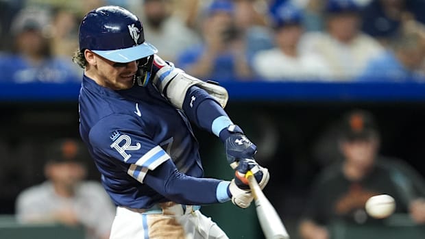 Kansas City Royals shortstop Bobby Witt Jr. (7) hits a single during a game against the San Francisco Giants.