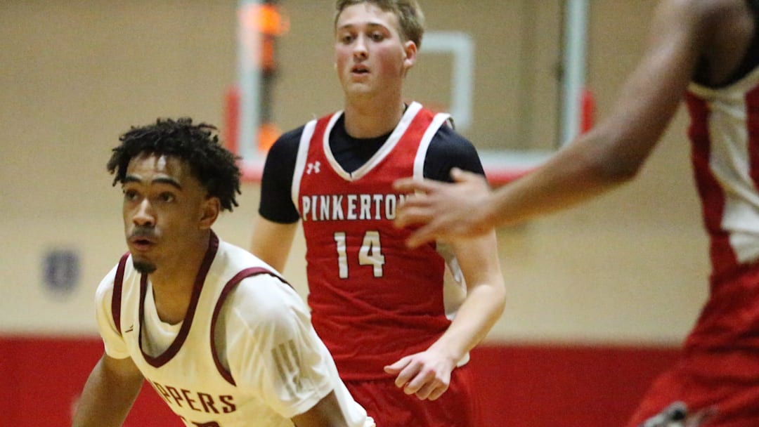 Portsmouth sophomore Damien Sanu drives through the defense and goes to the basket during Wednesday's Division I boys basketball semifinal at the Rochester Rec Center. Pinkerton survived with a 60-58 win and will play for the state championship on Sunday at the University of New Hampshire.