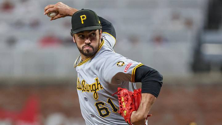 Sep 27, 2025; Cumberland, Georgia, USA; Pittsburgh Pirates pitcher Justin Lawrence (61) pitches the ball against the Atlanta Braves during the eighth inning at Truist Park. Mandatory Credit: Jordan Godfree-Imagn Images