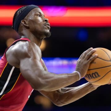 Apr 17, 2024; Philadelphia, Pennsylvania, USA; Miami Heat forward Jimmy Butler (22) lines up a shot against the Philadelphia 76ers during the second quarter of a play-in game of the 2024 NBA playoffs at Wells Fargo Center. Mandatory Credit: Bill Streicher-USA TODAY Sports
