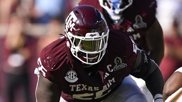 Dec 20, 2025; College Station, TX, USA; Texas A&M Aggies offensive lineman Ar'Maj Reed-Adams (55) blocks the line during the game between the Aggies and the Hurricanes at Kyle Field. Mandatory Credit: Jerome Miron-Imagn Images
