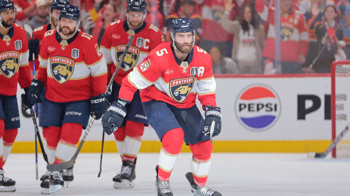 Jun 9, 2025; Sunrise, Florida, USA; Florida Panthers defenseman Aaron Ekblad (5) celebrates scoring during the third period against the Edmonton Oilers in game three of the 2025 Stanley Cup Final at Amerant Bank Arena. Mandatory Credit: Sam Navarro-Imagn Images Jun 9, 2025; Sunrise, Florida, USA; Florida Panthers defenseman Aaron Ekblad (5) celebrates scoring during the third period against the Edmonton Oilers in game three of the 2025 Stanley Cup Final at Amerant Bank Arena. Mandatory Credit: Sam Navarro-Imagn Images