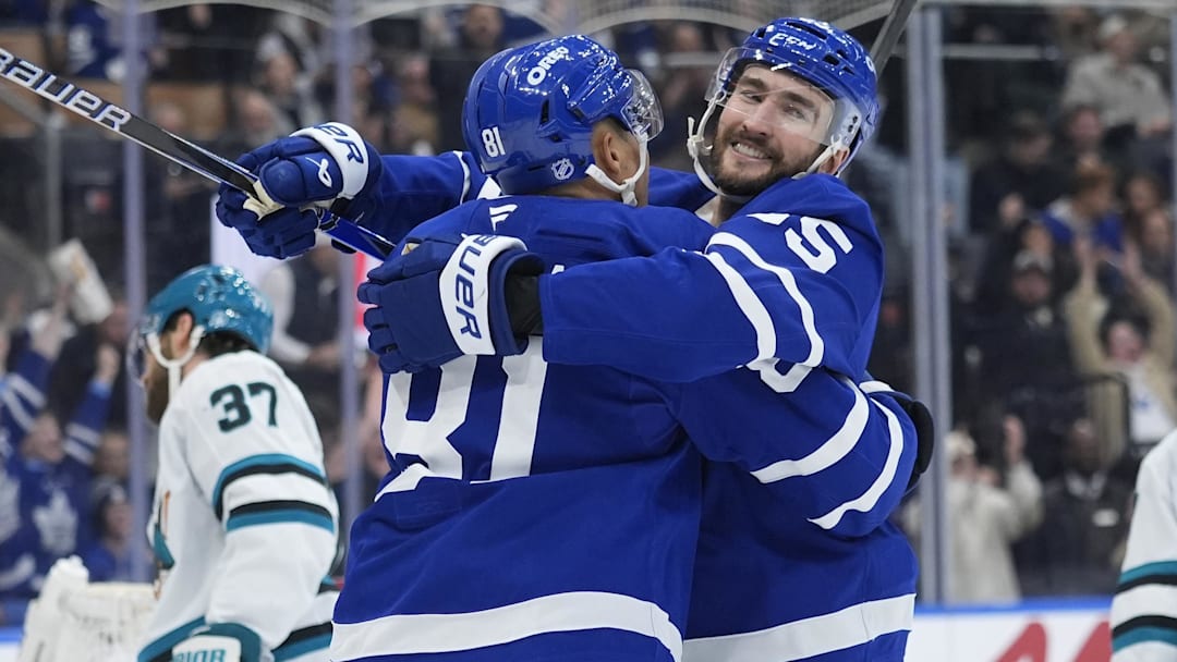 Dec 11, 2025; Toronto, Ontario, CAN; Toronto Maple Leafs forward Nick Roy (55) congratulates forward Dakota Joshua (81) on his goal against the San Jose Sharks during the first period at Scotiabank Arena. Mandatory Credit: John E. Sokolowski-Imagn Images