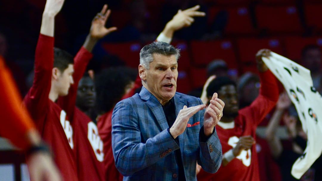 Oklahoma coach Porter Moser celebrates after a made 3-pointer against Auburn.