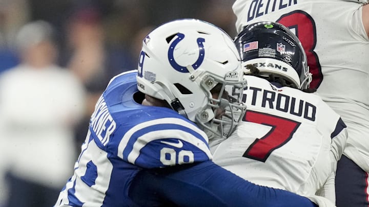 Jan 6, 2024; Indianapolis, Indiana, USA; Indianapolis Colts defensive tackle DeForest Buckner (99) sacks Houston Texans quarterback C.J. Stroud (7) at Lucas Oil Stadium. Mandatory Credit: Jenna Watson-Imagn Images