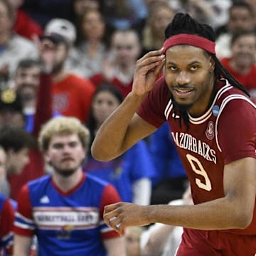 Arkansas Razorbacks forward Jonas Aidoo (9) reacts during the first half against the Kansas Jayhawks at Amica Mutual Pavilion.