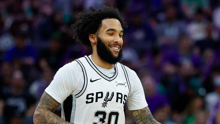 Mar 17, 2026; Sacramento, California, USA; San Antonio Spurs forward Julian Champagnie (30) celebrates after scoring during the third quarter against the Sacramento Kings at Golden 1 Center. Mandatory Credit: Sergio Estrada-Imagn Images
