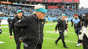 Dec 8, 2024; Nashville, Tennessee, USA;  Jacksonville Jaguars head coach Doug Pederson walks over to meet Tennessee Titans head coach Brian Callahan during the second half at Nissan Stadium. Mandatory Credit: Steve Roberts-Imagn Images