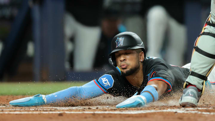 Sep 5, 2025; Miami, Florida, USA; Miami Marlins center fielder Victor Mesa Jr. (10) scores against the Philadelphia Phillies during the third inning at loanDepot Park. Mandatory Credit: Sam Navarro-Imagn Images