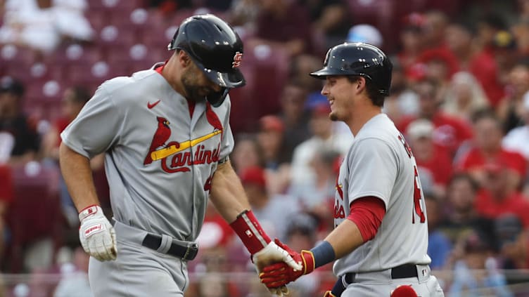 May 23, 2023; Cincinnati, Ohio, USA; St. Louis Cardinals designated hitter Paul Goldschmidt (left)