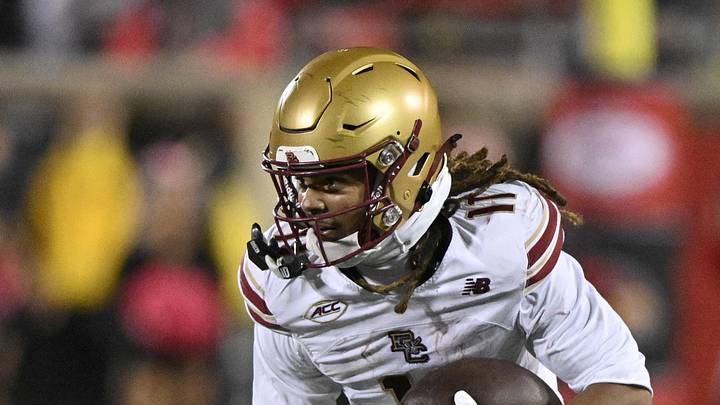 Oct 25, 2025; Louisville, Kentucky, USA;  Boston College Eagles wide receiver Lewis Bond (11) runs the ball against the Louisville Cardinals during the first half at L&N Federal Credit Union Stadium. Louisville defeated Boston College 38-24. Mandatory Credit: Jamie Rhodes-Imagn Images