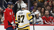 Apr 4, 2024; Washington, District of Columbia, USA; Washington Capitals left wing Alex Ovechkin (8) talks with Pittsburgh Penguins center Sidney Crosby (87) as repairs are made to the ice surface in the first period at Capital One Arena. Mandatory Credit: Geoff Burke-Imagn Images