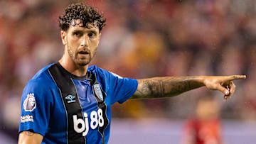 Marcos Senesi was subject to a controversial refereeing decision in the first half against Liverpool.