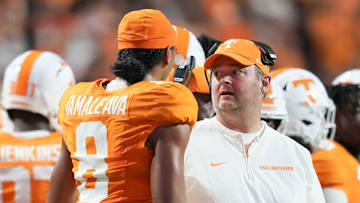 Tennessee head coach Josh Heupel and Tennessee quarterback Nico Iamaleava (8) chat on the sidelines during a game between Tennessee and Kent State at Neyland Stadium, in Knoxville, Tenn., Saturday, Sept. 14, 2024.
