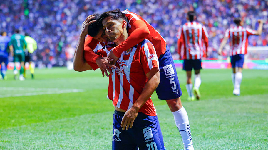 Chivas players celebrating. 
