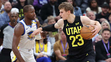 Oct 25, 2024; Salt Lake City, Utah, USA; Utah Jazz forward Lauri Markkanen (23) posts up on Golden State Warriors forward Jonathan Kuminga (00) during the second quarter at Delta Center. Mandatory Credit: Rob Gray-Imagn Images