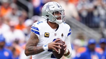 Dallas Cowboys quarterback Dak Prescott (4) looks to throw against the Denver Broncos in the first half at Empower Field at Mile High. 
