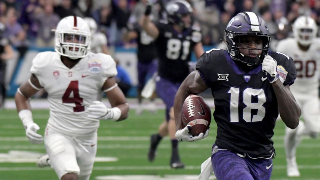 Dec 28, 2017; San Antonio, TX, United States; TCU Horned Frogs wide receiver Jalen Reagor (18) carries the ball past Stanford Cardinal cornerback Alameen Murphy (4) in the 2017 Alamo Bowl at Alamodome. Mandatory Credit: Kirby Lee-USA TODAY Sports