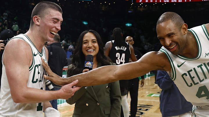 Mar 5, 2025; Boston, Massachusetts, USA; After scoring a career high 43 points, Boston Celtics guard Payton Pritchard (11) has a laugh with center Al Horford (42) after their win over the Portland Trail Blazers at TD Garden. Mandatory Credit: Winslow Townson-Imagn Images