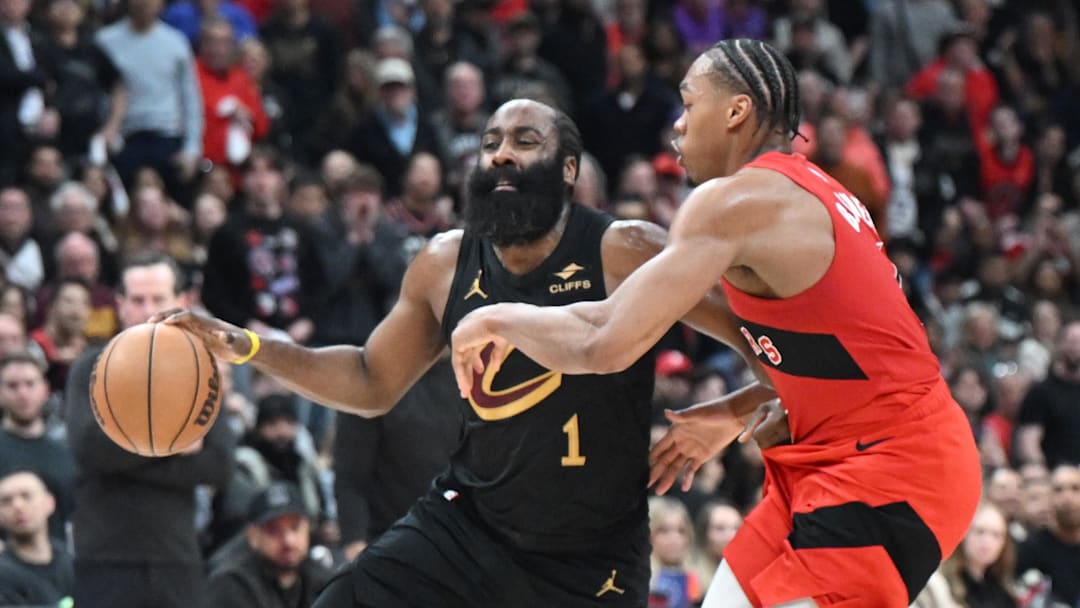 Apr 26, 2026; Toronto, Ontario, CAN;  Cleveland Cavaliers guard James Harden (1) tries to dribble the ball past Toronto Raptors forward Scottie Barnes (4) during game four of the first round of the 2026 NBA Playoffs at Scotiabank Arena. Mandatory Credit: Dan Hamilton-Imagn Images