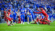 BYU quarterback Bear Bachmeier scores a touchdown against Utah