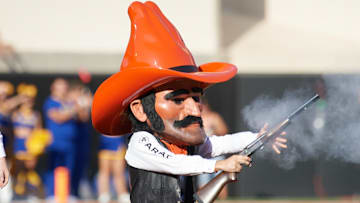 Sep 7, 2019; Stillwater, OK, USA; Oklahoma State Cowboys mascot Pistol Pete fires a shotgun before the game against the McNeese State Cowboys at Boone Pickens Stadium. Mandatory Credit: Rob Ferguson-Imagn Images