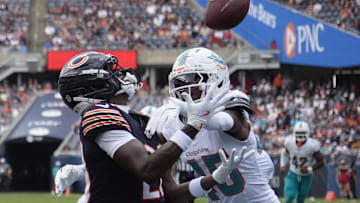Chicago Bears wide receiver Jahdae Walker (20) catches a touchdown pass as Miami Dolphins linebacker Jaelan Phillips (15) defends him during the second half at Soldier Field.