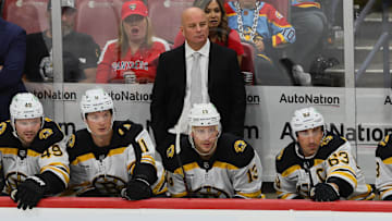 Oct 8, 2024; Sunrise, Florida, USA; Boston Bruins head coach Jim Montgomery looks on from the bench against the Florida Panthers during the third period at Amerant Bank Arena. Mandatory Credit: Sam Navarro-Imagn Images