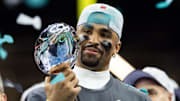 Eagles quarterback Jalen Hurts was named the MVP of Super Bowl LIX after he scored three touchdowns (two passing and one rushing) and set a Super Bowl record for quarterback rushing yards with 72.