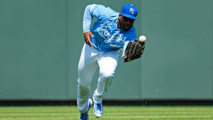 May 28, 2023; Kansas City, Missouri, USA; Kansas City Royals right fielder Jackie Bradley Jr. (41) is unable to make the catch during the eighth inning against the Washington Nationals at Kauffman Stadium. Mandatory Credit: Jay Biggerstaff-USA TODAY Sports