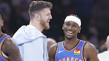 Nov 13, 2024; Oklahoma City, Oklahoma, USA;  Oklahoma City Thunder center Isaiah Hartenstein (55) and guard Shai Gilgeous-Alexander (2) before the start of a game against the New Orleans Pelicans at Paycom Center. Mandatory Credit: Alonzo Adams-Imagn Images