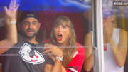 Taylor Swift celebrates an almost-score by Travis Kelce. 