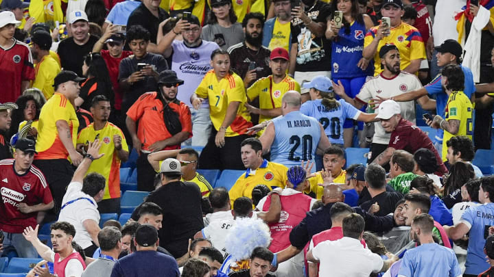 Jul 10, 2024; Charlotte, NC, USA;  Fans get into an altercation with players and staff from Uruguay after the Copa Armerica Semifinal match between Uruguay and Colombia at Bank of America Stadium. Mandatory Credit: Jim Dedmon-USA TODAY Sports