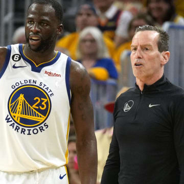 Apr 23, 2023; San Francisco, California, USA; Golden State Warriors forward Draymond Green (23) and assistant coach Kenny Atkinson (right) talk during the third quarter of game four of the 2023 NBA playoffs against the Sacramento Kings at Chase Center. Mandatory Credit: Darren Yamashita-USA TODAY Sports