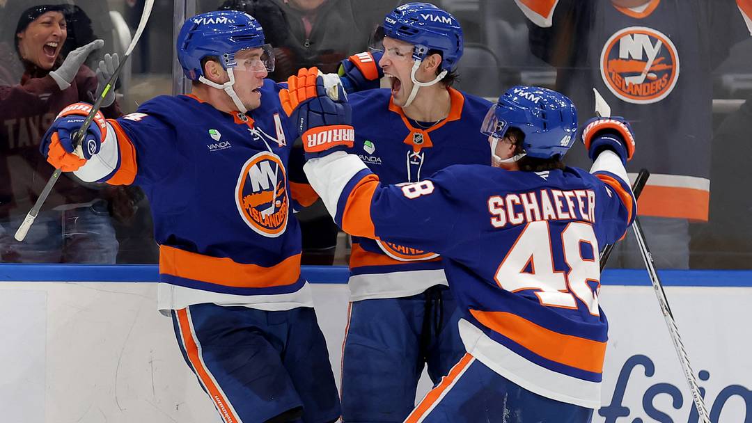 Feb 3, 2026; Elmont, New York, USA; New York Islanders center Bo Horvat (14) celebrates his game winning overtime goal against the Pittsburgh Penguins with center Mathew Barzal (13) and defenseman Matthew Schaefer (48) at UBS Arena. Mandatory Credit: Brad Penner-Imagn Images Feb 3, 2026; Elmont, New York, USA; New York Islanders center Bo Horvat (14) celebrates his game winning overtime goal against the Pittsburgh Penguins with center Mathew Barzal (13) and defenseman Matthew Schaefer (48) at UBS Arena. Mandatory Credit: Brad Penner-Imagn Images