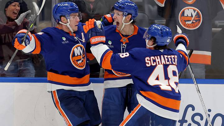 Feb 3, 2026; Elmont, New York, USA; New York Islanders center Bo Horvat (14) celebrates his game winning overtime goal against the Pittsburgh Penguins with center Mathew Barzal (13) and defenseman Matthew Schaefer (48) at UBS Arena. Mandatory Credit: Brad Penner-Imagn Images Feb 3, 2026; Elmont, New York, USA; New York Islanders center Bo Horvat (14) celebrates his game winning overtime goal against the Pittsburgh Penguins with center Mathew Barzal (13) and defenseman Matthew Schaefer (48) at UBS Arena. Mandatory Credit: Brad Penner-Imagn Images