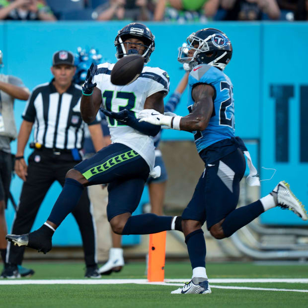 Seattle Seahawks wide receiver Easop Winston Jr. (13) hauls in a touchdown pass.