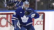 Dec 12, 2024; Toronto, Ontario, CAN; Toronto Maple Leafs goaltender Anthony Stolarz (41) makes a glove save during warmup before a game against the Anaheim Ducks at Scotiabank Arena. Mandatory Credit: John E. Sokolowski-Imagn Images